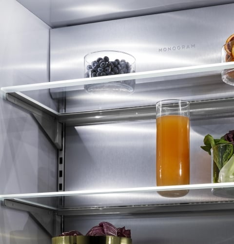 Refrigerator with Ramp-Up LED Interior Shelves